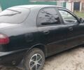 Чорний Деу Ланос, об'ємом двигуна 1.4 л та пробігом 180 тис. км за 1600 $, фото 3 на Automoto.ua