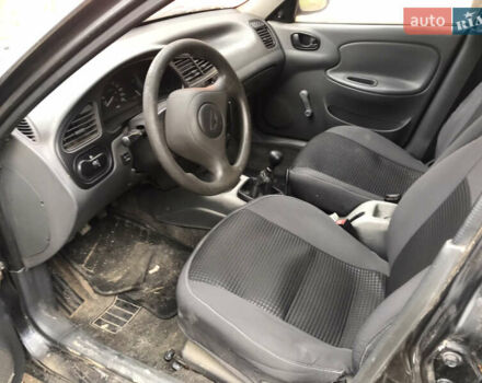 Черный Дэу Ланос, объемом двигателя 1.5 л и пробегом 150 тыс. км за 950 $, фото 8 на Automoto.ua