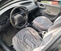Черный Дэу Ланос, объемом двигателя 1.5 л и пробегом 300 тыс. км за 1900 $, фото 2 на Automoto.ua