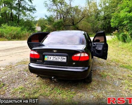Черный Дэу Ланос, объемом двигателя 1.4 л и пробегом 197 тыс. км за 2500 $, фото 2 на Automoto.ua