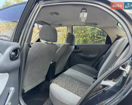 Черный Дэу Ланос, объемом двигателя 1.5 л и пробегом 100 тыс. км за 2900 $, фото 22 на Automoto.ua