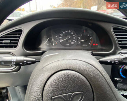 Черный Дэу Ланос, объемом двигателя 1.5 л и пробегом 231 тыс. км за 2900 $, фото 10 на Automoto.ua