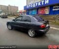 Черный Дэу Ланос, объемом двигателя 1.6 л и пробегом 200 тыс. км за 2100 $, фото 1 на Automoto.ua