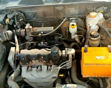 Черный Дэу Ланос, объемом двигателя 1.5 л и пробегом 140 тыс. км за 1100 $, фото 2 на Automoto.ua