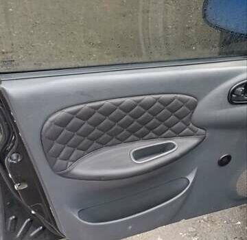 Чорний Деу Ланос, об'ємом двигуна 1.5 л та пробігом 190 тис. км за 2500 $, фото 6 на Automoto.ua