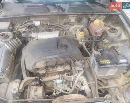 Чорний Деу Ланос, об'ємом двигуна 1.39 л та пробігом 320 тис. км за 1500 $, фото 3 на Automoto.ua