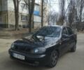 Черный Дэу Ланос, объемом двигателя 1.5 л и пробегом 246 тыс. км за 2650 $, фото 1 на Automoto.ua