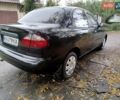 Черный Дэу Ланос, объемом двигателя 1.5 л и пробегом 350 тыс. км за 2000 $, фото 2 на Automoto.ua