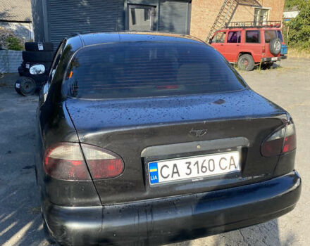 Черный Дэу Ланос, объемом двигателя 1.5 л и пробегом 250 тыс. км за 2300 $, фото 3 на Automoto.ua