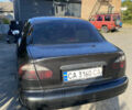 Черный Дэу Ланос, объемом двигателя 1.5 л и пробегом 250 тыс. км за 2300 $, фото 3 на Automoto.ua