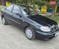 Черный Дэу Ланос, объемом двигателя 1.5 л и пробегом 99 тыс. км за 3200 $, фото 1 на Automoto.ua