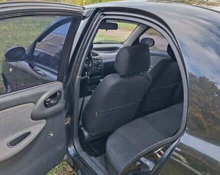 Чорний Деу Ланос, об'ємом двигуна 1.5 л та пробігом 219 тис. км за 1900 $, фото 5 на Automoto.ua