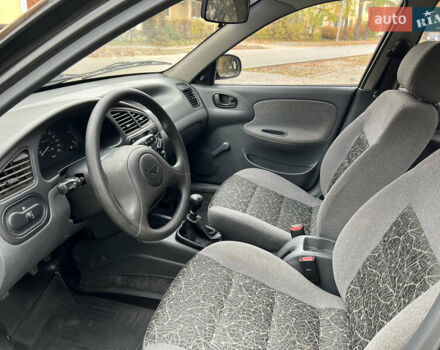 Чорний Деу Ланос, об'ємом двигуна 1.4 л та пробігом 89 тис. км за 2999 $, фото 16 на Automoto.ua