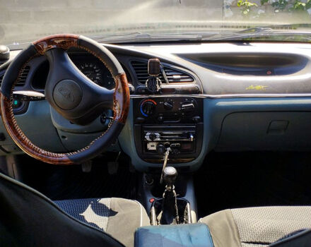 Черный Дэу Ланос, объемом двигателя 1.5 л и пробегом 240 тыс. км за 3300 $, фото 3 на Automoto.ua