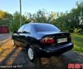 Черный Дэу Ланос, объемом двигателя 1.5 л и пробегом 224 тыс. км за 2250 $, фото 2 на Automoto.ua