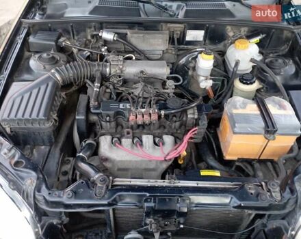 Чорний Деу Ланос, об'ємом двигуна 1.5 л та пробігом 184 тис. км за 3000 $, фото 1 на Automoto.ua