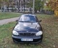 Чорний Деу Ланос, об'ємом двигуна 1.5 л та пробігом 219 тис. км за 1900 $, фото 1 на Automoto.ua