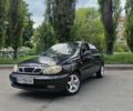 Чорний Деу Ланос, об'ємом двигуна 1.5 л та пробігом 111 тис. км за 2400 $, фото 1 на Automoto.ua