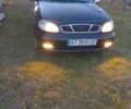 Черный Дэу Ланос, объемом двигателя 1.5 л и пробегом 211 тыс. км за 1750 $, фото 1 на Automoto.ua