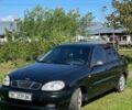 Черный Дэу Ланос, объемом двигателя 1.6 л и пробегом 100 тыс. км за 2300 $, фото 2 на Automoto.ua
