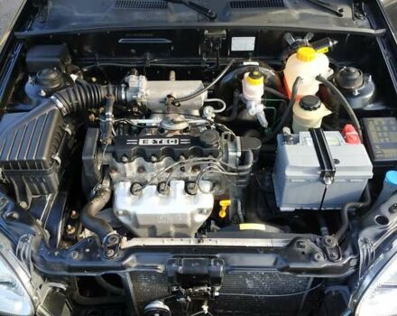 Черный Дэу Ланос, объемом двигателя 1.5 л и пробегом 37 тыс. км за 3950 $, фото 24 на Automoto.ua