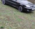 Черный Дэу Ланос, объемом двигателя 1.5 л и пробегом 250 тыс. км за 2200 $, фото 1 на Automoto.ua