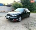 Чорний Деу Ланос, об'ємом двигуна 1.5 л та пробігом 205 тис. км за 1650 $, фото 1 на Automoto.ua
