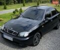 Черный Дэу Ланос, объемом двигателя 1.5 л и пробегом 257 тыс. км за 2450 $, фото 1 на Automoto.ua