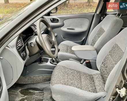 Чорний Деу Ланос, об'ємом двигуна 1.5 л та пробігом 198 тис. км за 2600 $, фото 16 на Automoto.ua