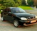 Черный Дэу Ланос, объемом двигателя 1.5 л и пробегом 240 тыс. км за 2512 $, фото 1 на Automoto.ua