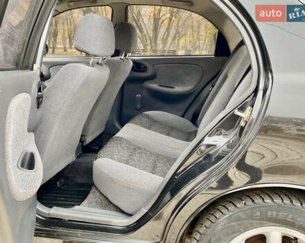 Черный Дэу Ланос, объемом двигателя 1.5 л и пробегом 198 тыс. км за 2600 $, фото 20 на Automoto.ua