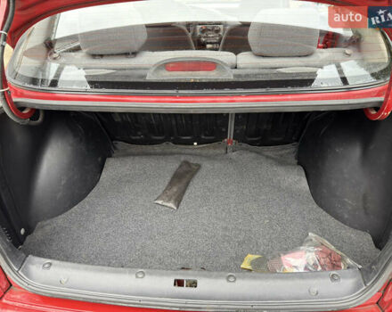 Черный Дэу Ланос, объемом двигателя 1.6 л и пробегом 156 тыс. км за 2400 $, фото 13 на Automoto.ua