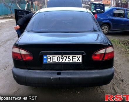 Чорний Деу Ланос, об'ємом двигуна 1.5 л та пробігом 198 тис. км за 1700 $, фото 4 на Automoto.ua