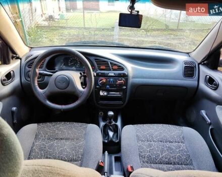 Черный Дэу Ланос, объемом двигателя 1.4 л и пробегом 165 тыс. км за 1450 $, фото 10 на Automoto.ua