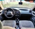 Черный Дэу Ланос, объемом двигателя 1.4 л и пробегом 165 тыс. км за 1450 $, фото 10 на Automoto.ua