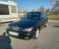 Чорний Деу Ланос, об'ємом двигуна 1.5 л та пробігом 184 тис. км за 3000 $, фото 1 на Automoto.ua