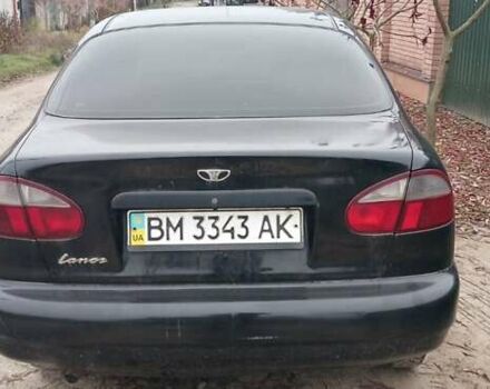 Чорний Деу Ланос, об'ємом двигуна 1.4 л та пробігом 180 тис. км за 1600 $, фото 1 на Automoto.ua
