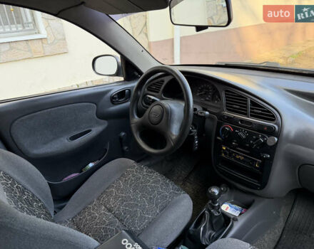 Черный Дэу Ланос, объемом двигателя 1.5 л и пробегом 100 тыс. км за 2900 $, фото 31 на Automoto.ua