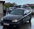 Черный Дэу Ланос, объемом двигателя 1.5 л и пробегом 251 тыс. км за 1400 $, фото 1 на Automoto.ua