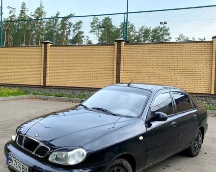 Черный Дэу Ланос, объемом двигателя 1.4 л и пробегом 245 тыс. км за 1700 $, фото 3 на Automoto.ua