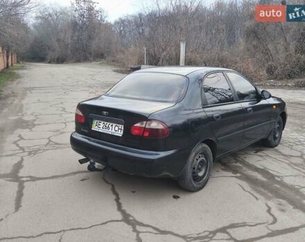 Черный Дэу Ланос, объемом двигателя 1.5 л и пробегом 216 тыс. км за 2699 $, фото 2 на Automoto.ua