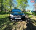 Черный Дэу Ланос, объемом двигателя 1.5 л и пробегом 333 тыс. км за 2300 $, фото 1 на Automoto.ua