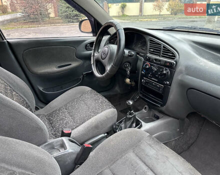Черный Дэу Ланос, объемом двигателя 1.5 л и пробегом 267 тыс. км за 1499 $, фото 7 на Automoto.ua