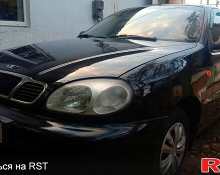 Черный Дэу Ланос, объемом двигателя 1.5 л и пробегом 276 тыс. км за 2000 $, фото 1 на Automoto.ua