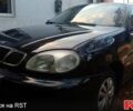 Черный Дэу Ланос, объемом двигателя 1.5 л и пробегом 276 тыс. км за 2000 $, фото 1 на Automoto.ua