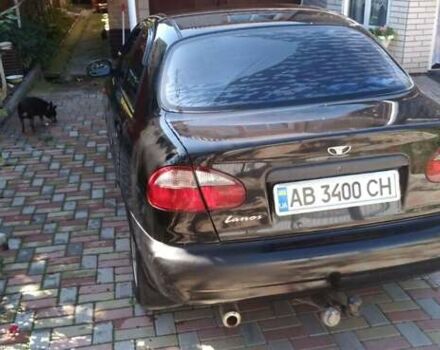 Черный Дэу Ланос, объемом двигателя 1.5 л и пробегом 156 тыс. км за 2000 $, фото 7 на Automoto.ua