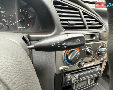 Черный Дэу Ланос, объемом двигателя 1.6 л и пробегом 156 тыс. км за 2400 $, фото 19 на Automoto.ua