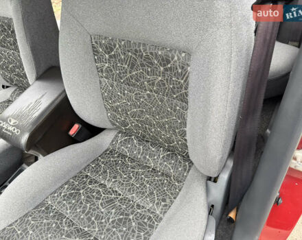 Черный Дэу Ланос, объемом двигателя 1.6 л и пробегом 156 тыс. км за 2400 $, фото 25 на Automoto.ua