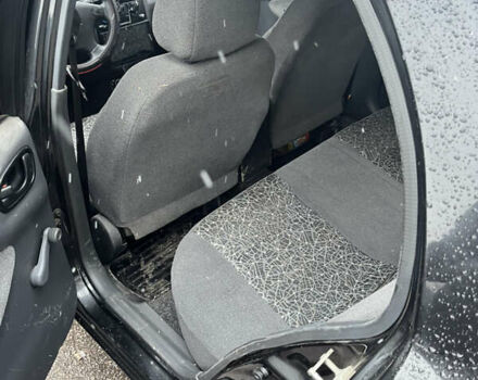 Черный Дэу Ланос, объемом двигателя 1.5 л и пробегом 230 тыс. км за 2200 $, фото 6 на Automoto.ua