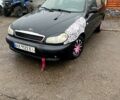 Чорний Деу Ланос, об'ємом двигуна 1.4 л та пробігом 202 тис. км за 1400 $, фото 1 на Automoto.ua